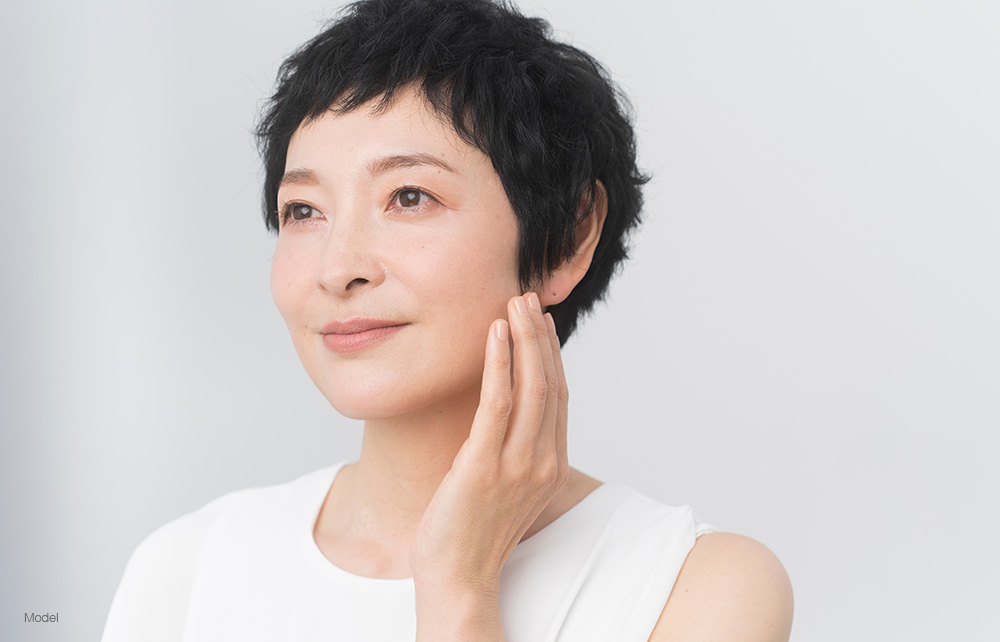 Mature woman with short dark hair