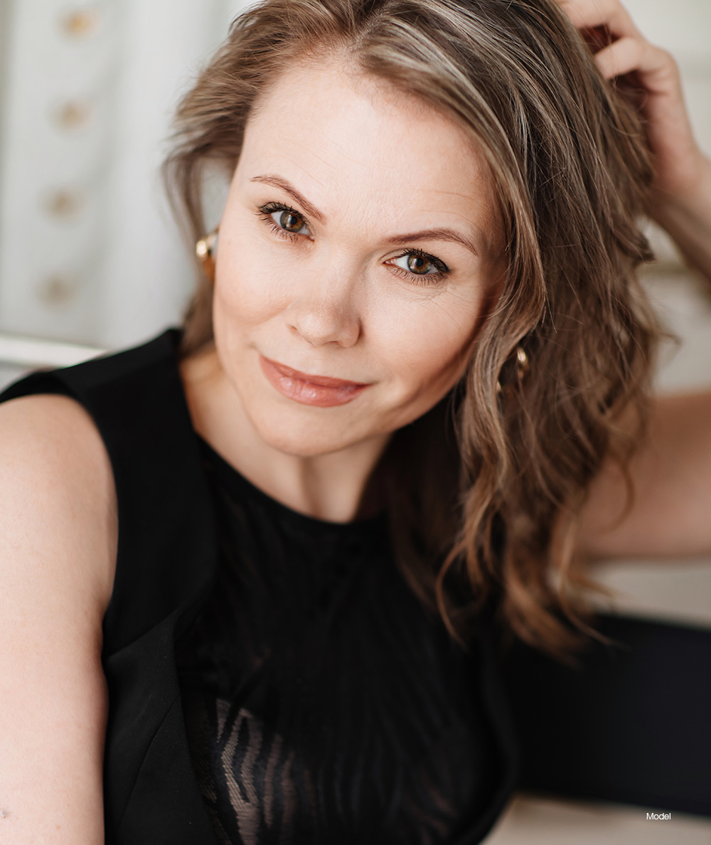 Mature woman in a black dress
